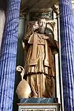 Statue de saint François de Sales, détail du retable.