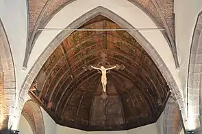 Voûte du chœur recouverte de panneaux de bois peints (1588).