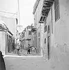 Sur cette vue de la rue Droite dans la vieille ville de Damas, prise en 1950 par le photographe néerlandais Willem van de Poll, à droite, la maison que la tradition dit être celle d'Ananie.