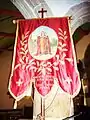 Église paroissiale Saint-Milliau : bannière de procession en l'honneur de saint Milliau