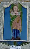 Chapelle Saint-Trémeur : retable et statue de saint Trémeur.