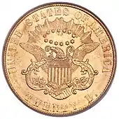 Pièce de monnaie en or avec un aigle héraldique, tenant un ruban avec l'inscription E PLURIBUS UNUM, au centre, surmonté de treize étoiles en ovale, et les isncriptions UNITED STATES OF AMERICA ET TWENTY D.