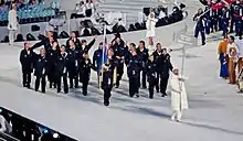 Photographie de l'entrée de la délégation néo-zélandaise lors de la cérémonie d'ouverture.