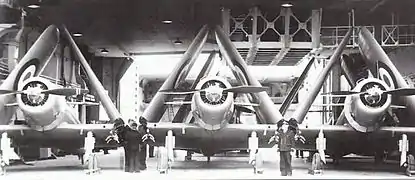 3 Vought V-156F français dans le hangar du porte-avions Béarn