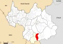 Carte en noir et blanc représentant la Savoie avec le territoire d'Orelle en rouge et celui de Maurienne-Galibier en jaune.