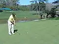 Putter sur le 12e green à Augusta National