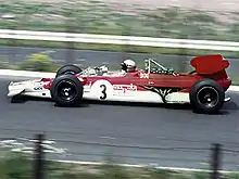 Photo de Mario Andretti pilotant une Lotus au Grand Prix d'Allemagne 1969.