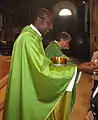 José Manuel Imbamba, durant une messe à l'église Saint-François à Lodi, le 23 août 2015.