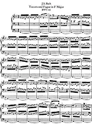 Partition à trois portées.