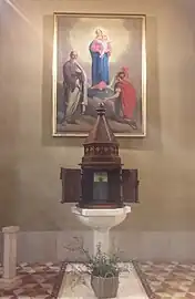 Les fonts baptismaux de l'église paroissiale de Saint-Barthélemy, à Marne (Italie).