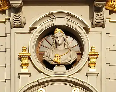 Buste de sainte Barbe sur la façade de la Maison de la Chaloupe d'Or sur la Grand-Place de Bruxelles (Godefroid Van den Kerckhove, 1872).