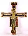 Crucifix italien du XIIIe siècle à la pinacothèque de Lucques, la Vierge est toujours à la droite de son Fils et saint Jean, l'apôtre préféré, à sa gauche. Les symboles des évangélistes sont de chaque côté du bras horizontal.