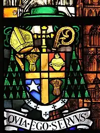 Blason de Monseigneur Kerkhofs sur le vitrail de la Cathédrale Saint-Paul de Liège.