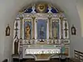 Retable de la Vierge (XIXe&nbsp;siècle), avec une statue de saint Hubert