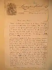 Lettre manuscrite avec en-tête d'un hôtel et illustration d'un soldat avec chapeau et fusil.