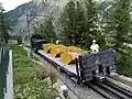 Train spécial du chemin de fer du Montenvers acheminant des matériaux.