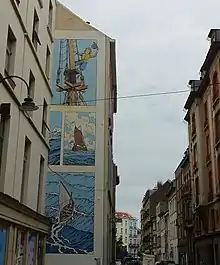 Façade d'immeuble peint de dessins de la série Cori le Moussaillon