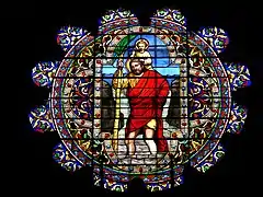 Rosace représentant saint Christophe et l'Enfant Jésus.