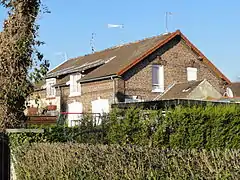 Des habitations groupées par quatre.