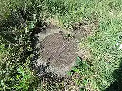 La tête de puits matérialisée en 2011.