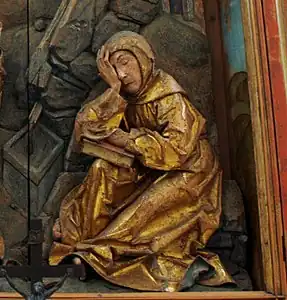 Frère Léon, sculpté par Tilman Riemenschneider pour le retable de saint François dans l'église des Franciscains (Franziskanerkirche) à Rothenburg ob der Tauber.