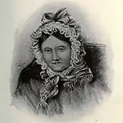 Portrait en buste d'une femme âgée en bonnet de nuit de dentelle.