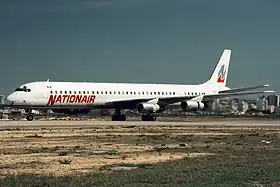 C-GMXQ, le Douglas DC-8 impliqué dans l'accident, ici à l'aéroport de Faro en novembre 1988.