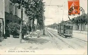 Le Tramway Enghien-Trinité sur la route nationale à Épinay, avant 1912.