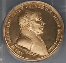 Médaille représentant le buste d'un homme, tourné vers la droite.