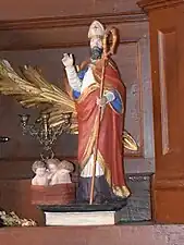 Saint Nicolas et les trois clercs au saloir en bois peint du XVIIIe siècle.