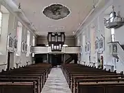 Vue intérieure de la nefvers la tribune d'orgue.
