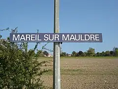 Panneau indiquant le nom de la gare.