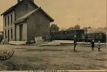 Carte postale ancienne montrant la gare de Wailly, avec un train.