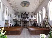 Vue intérieure de la nefvers la tribune d'orgue.