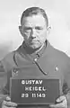 Gustav Heigel (de), chef Kommando et chef des blocs d'arrestation