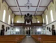 Vue intérieure de la nefvers la tribune d'orgue.