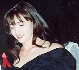Shannen Doherty interprète Brenda Walsh.