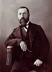 Portrait en noir et blanc du fondateur de la Ligue pour l'enseignement.