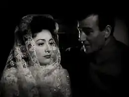 Quelque part en France (1942) : Joan Crawford et John Wayne
