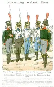 Des soldats napoléoniens au garde-à-vous, avec leurs officiers.