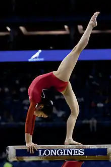 Passage en pont durant une souplesse avant.