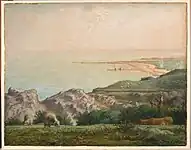 Ce paysage de bord de mer s'observe depuis des prairies où paissent des moutons.