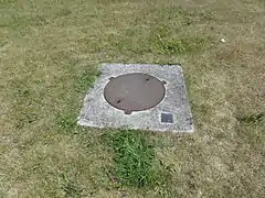 La tête de puits matérialisée.