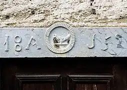 Linteau, daté de 1852.