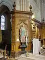 Boiseries devant le pilier nord-est ; statue de sainte Marguerite.