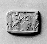 Impression moderne de sceau-cylindre représentant un griffon androcéphale attaquant un cheval. XIIIe siècle av. J.-C. Walters Art Museum.