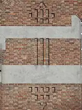 Détail d'un motif en briques.