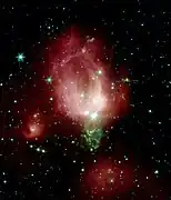NGC 7129 dans le domaine de l'infrarouge par le télescope spatial Spitzer.
