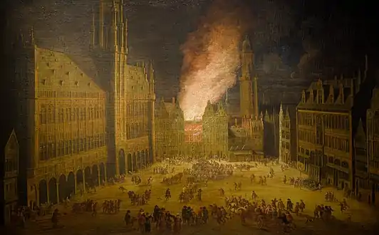 La Maison de la Louve en flammes en 1690, avec la Maison du Roi à droite.