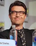 Noah Bean interprète Ryan Fletcher.